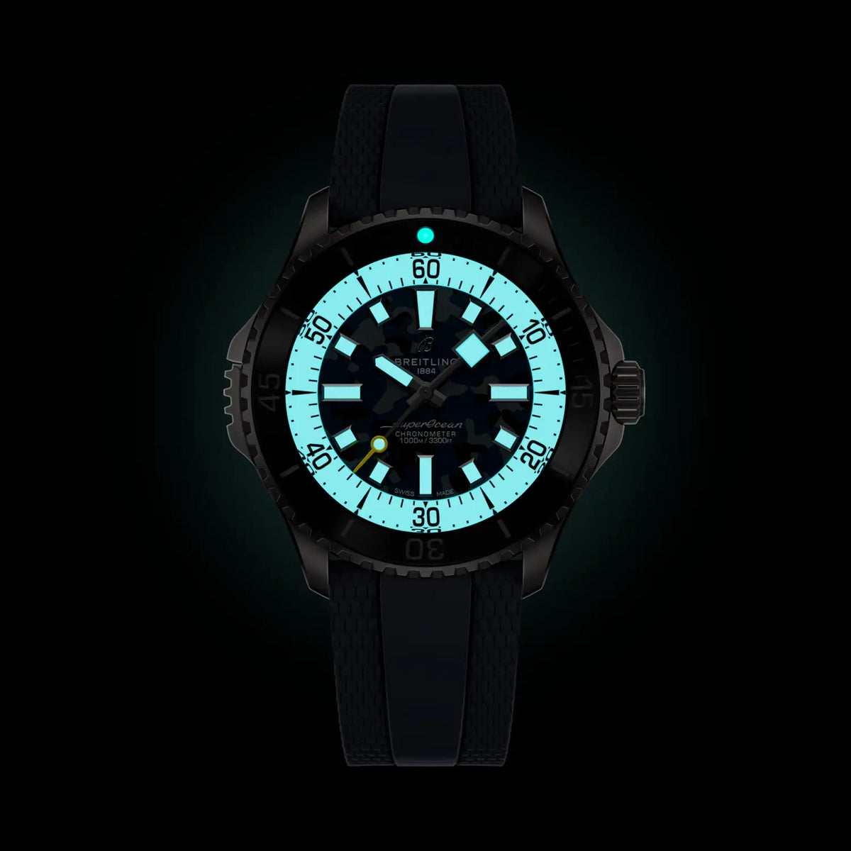 Orologio subacqueo con quadrante luminescente verde e cinturino in gomma nero