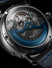 Orologio automatico fondello blu a vista con movimento openwork e cinturino nero
