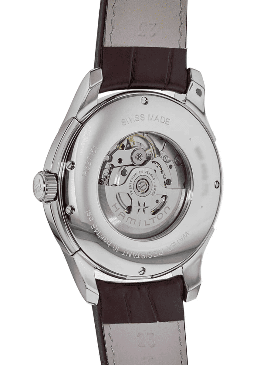 Orologio da polso con fondello a vista e cinturino in pelle marrone, cassa in acciaio