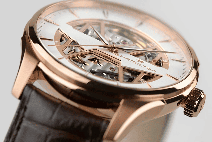Orologio con cassa rosé e movimento a vista sul quadrante bianco open heart