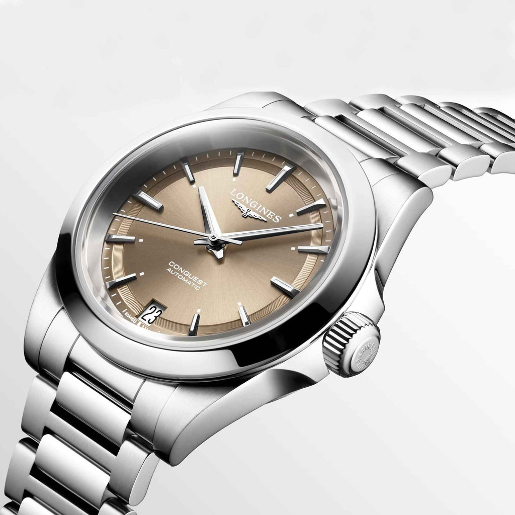 Orologio automatico in acciaio con quadrante marrone, datario 23, corona laterale