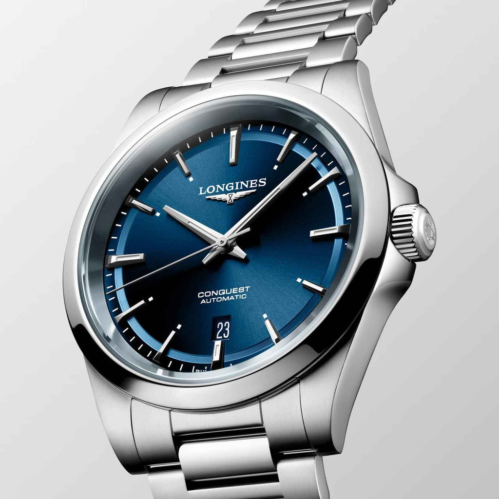 Orologio Longines Conquest con quadrante blu, indici e data 23, cassa e bracciale acciaio
