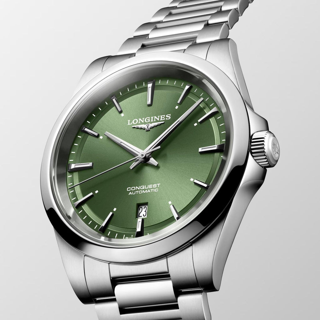 Orologio Longines Conquest con quadrante verde e bracciale in acciaio automatico.
