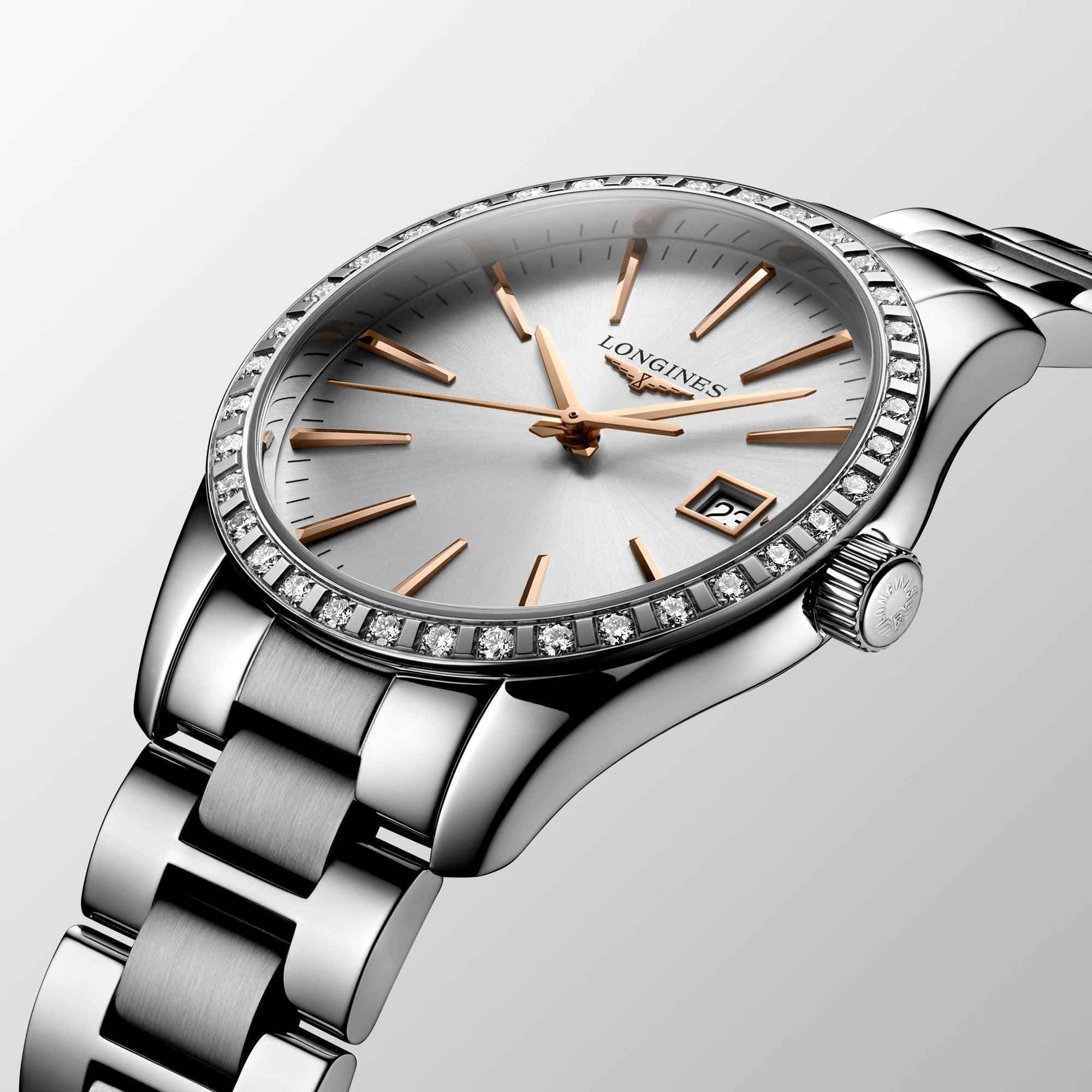 Orologio Longines in acciaio, quadrante bianco con indici e lancette oro rosa, cornice diamanti