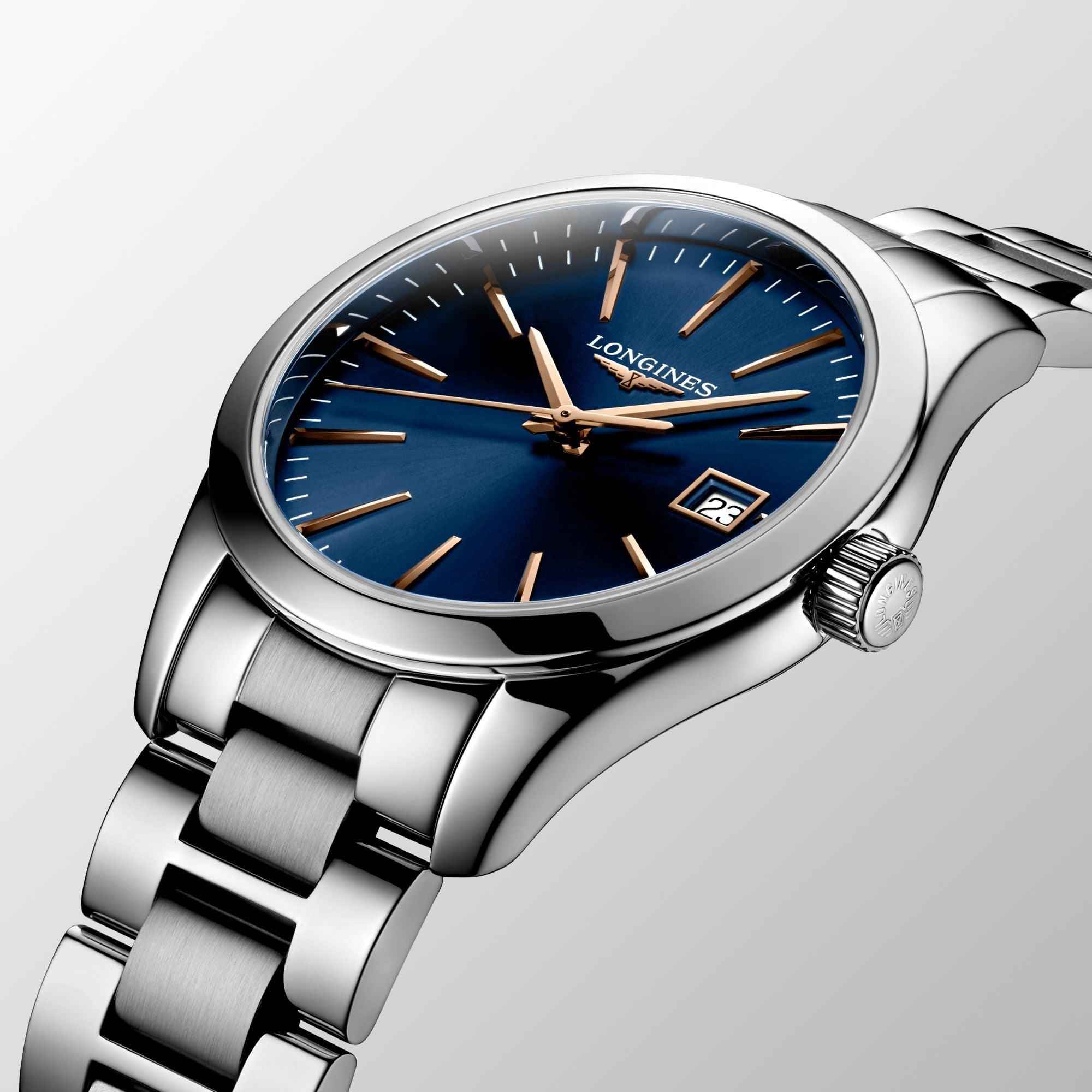 Orologio da polso con quadrante blu scuro, indici e lancette oro rosa
