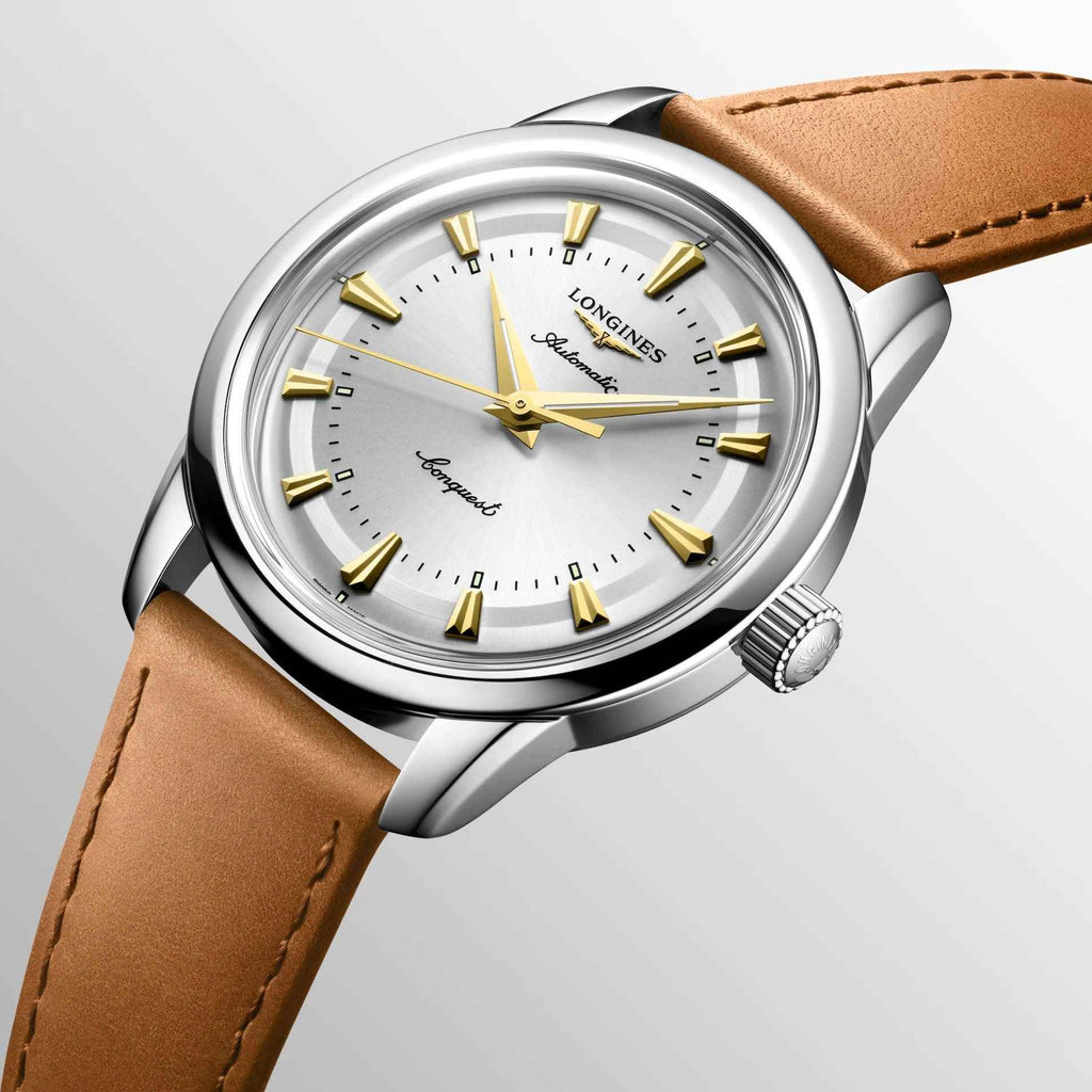 Orologio Conquest automatico: cassa acciaio lucida, quadrante bianco con indici dorati