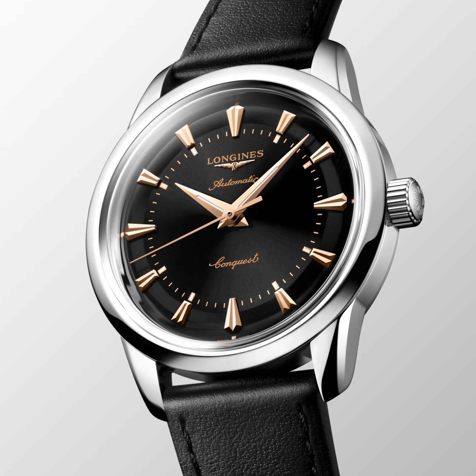 Orologio automatico: quadrante nero, lancette dorate, cassa d’acciaio e cinturino nero