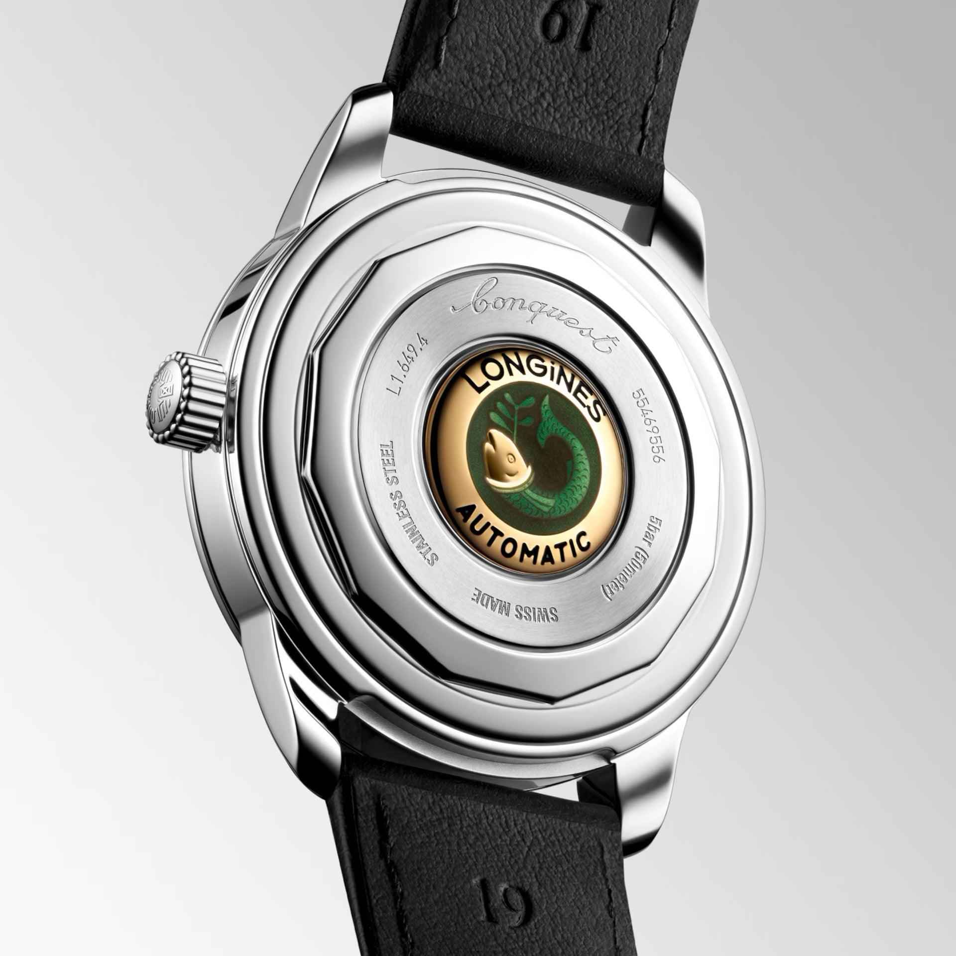 Orologio automatico: fondello in acciaio con rotore visibile e motivo verde