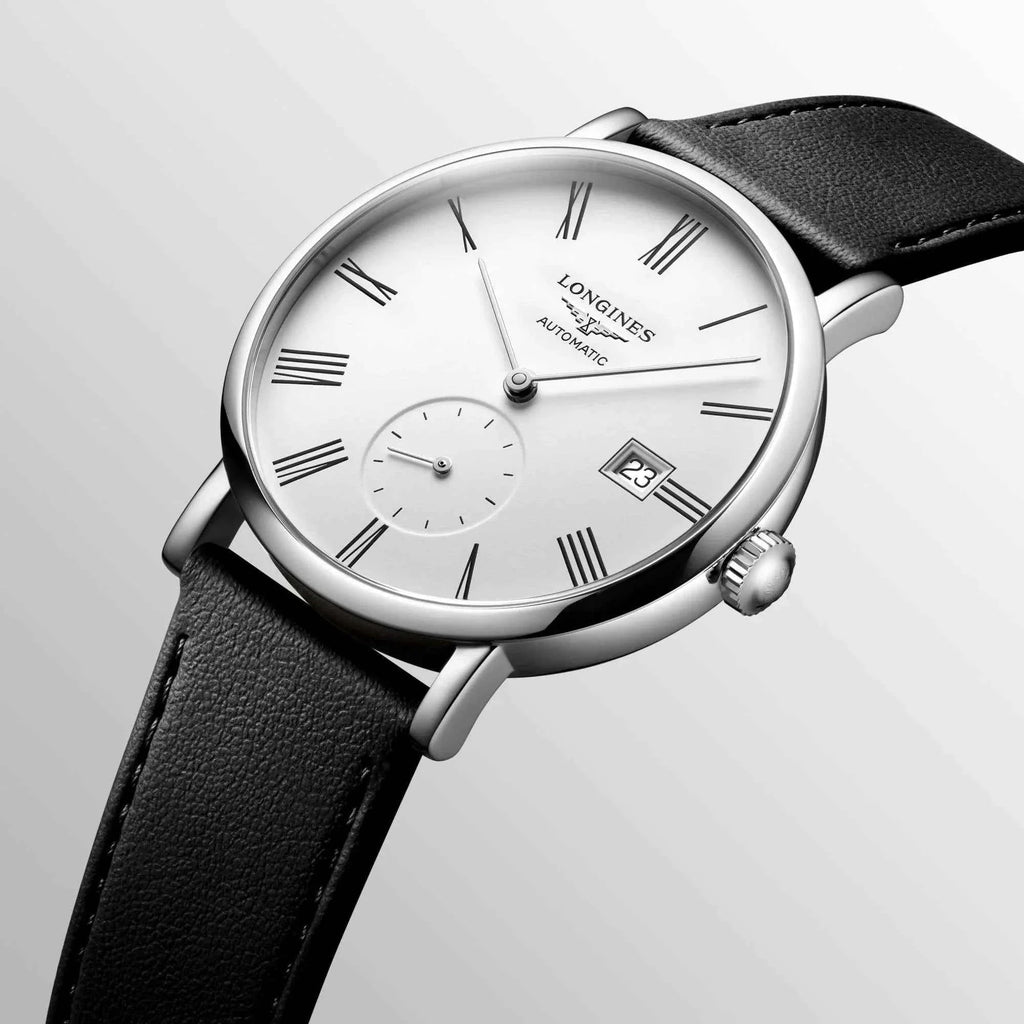Orologio da polso automatico con quadrante bianco, datario e cinturino nero in vista