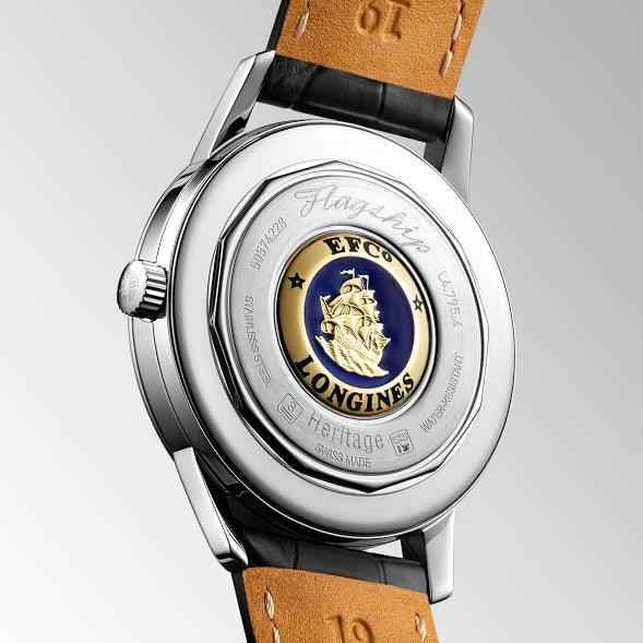 Fondello dell’orologio Longines in acciaio con stemma e incisioni, cinturino pelle nera