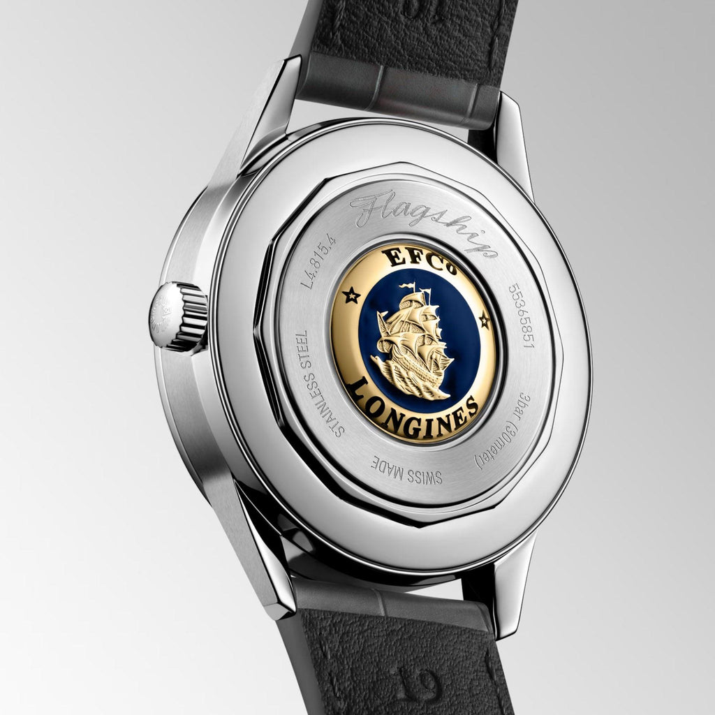 Orologio: fondello in acciaio con disco blu e nave dorata, cinturino in pelle scura