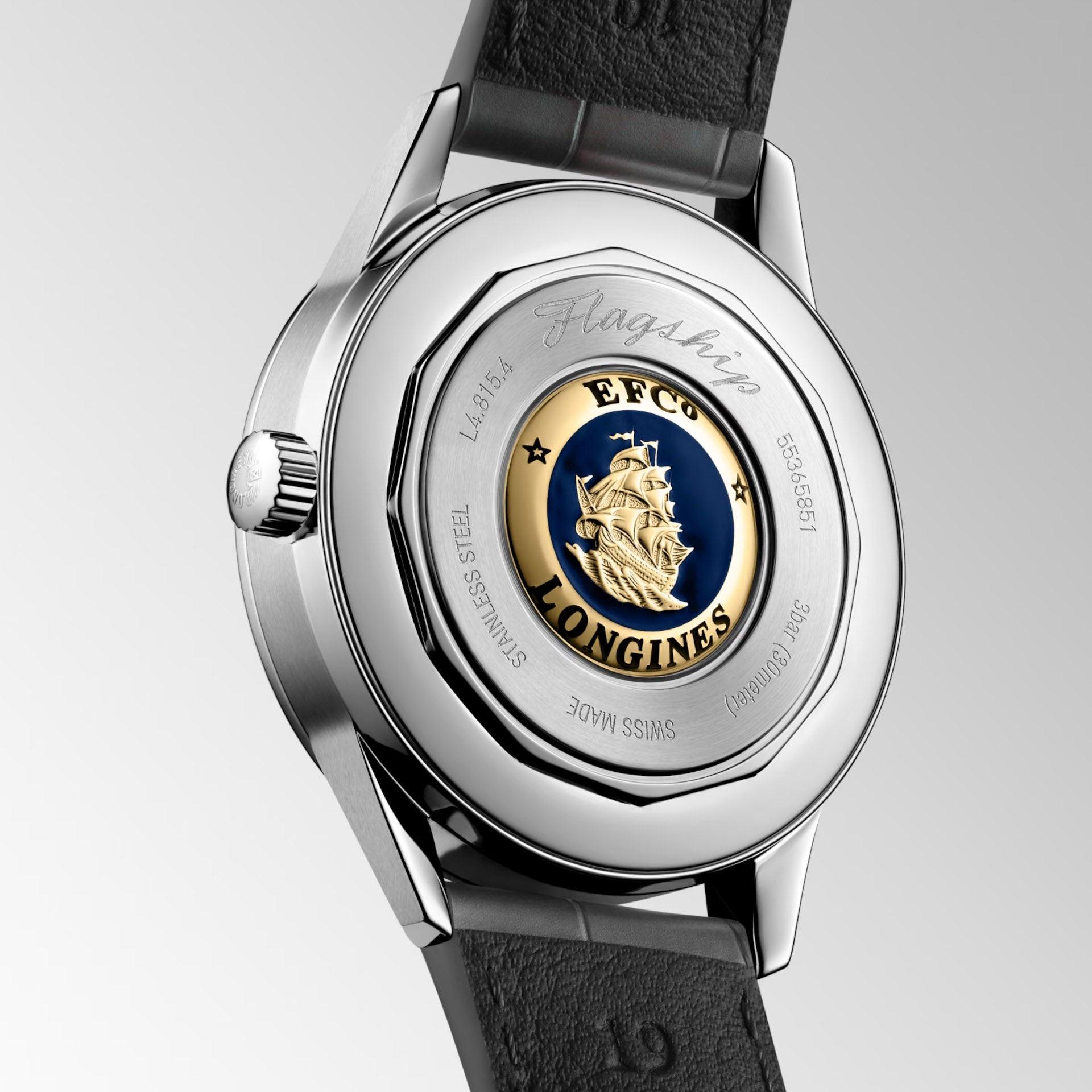Orologio: fondello in acciaio con disco blu e nave dorata, cinturino in pelle scura