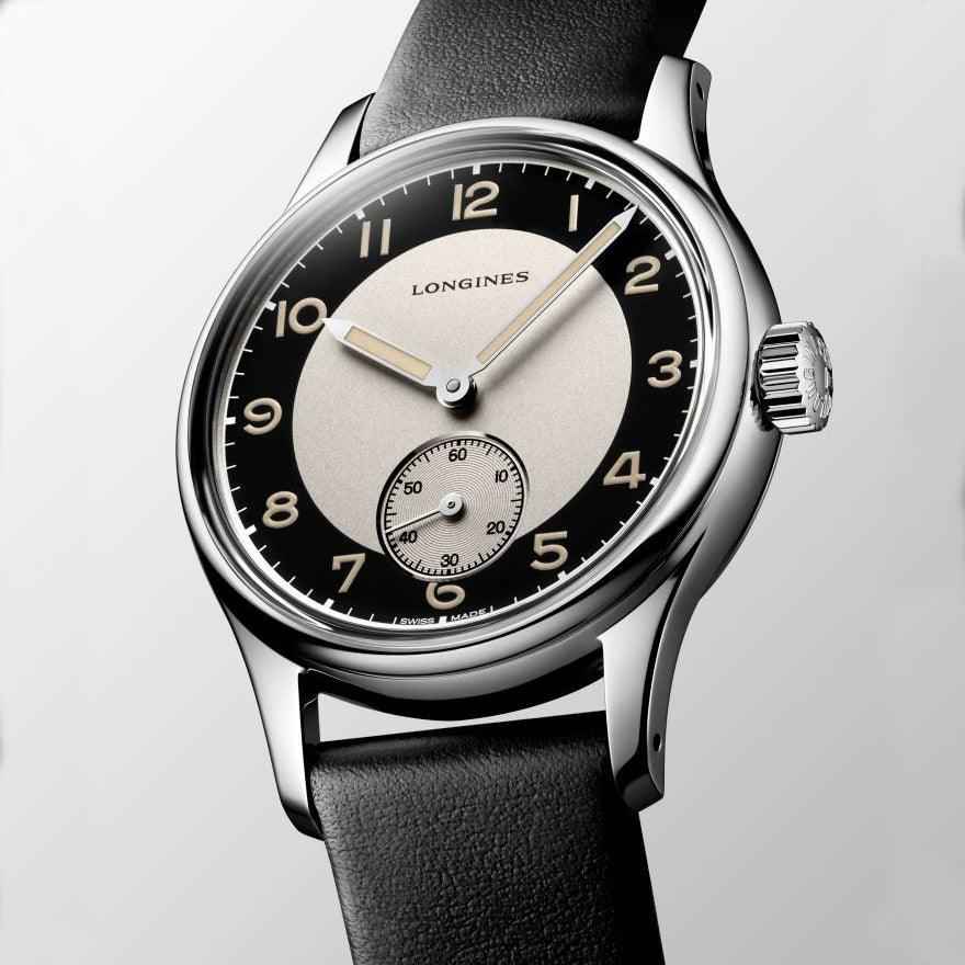 Orologio Longines con quadrante nero e beige, indici arabi e cinturino nero