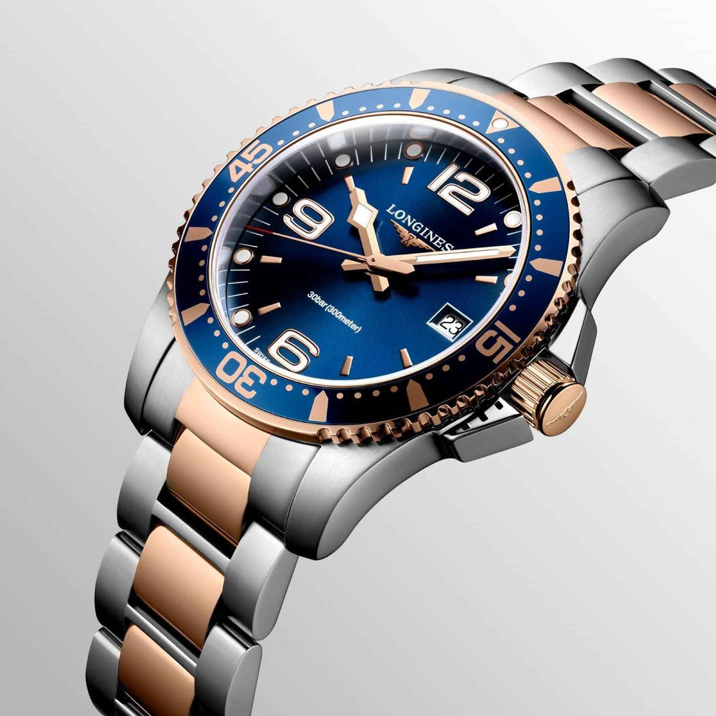 Orologio subacqueo blu con lunetta in acciaio e dettagli PVD oro rosa, cassa 41 mm