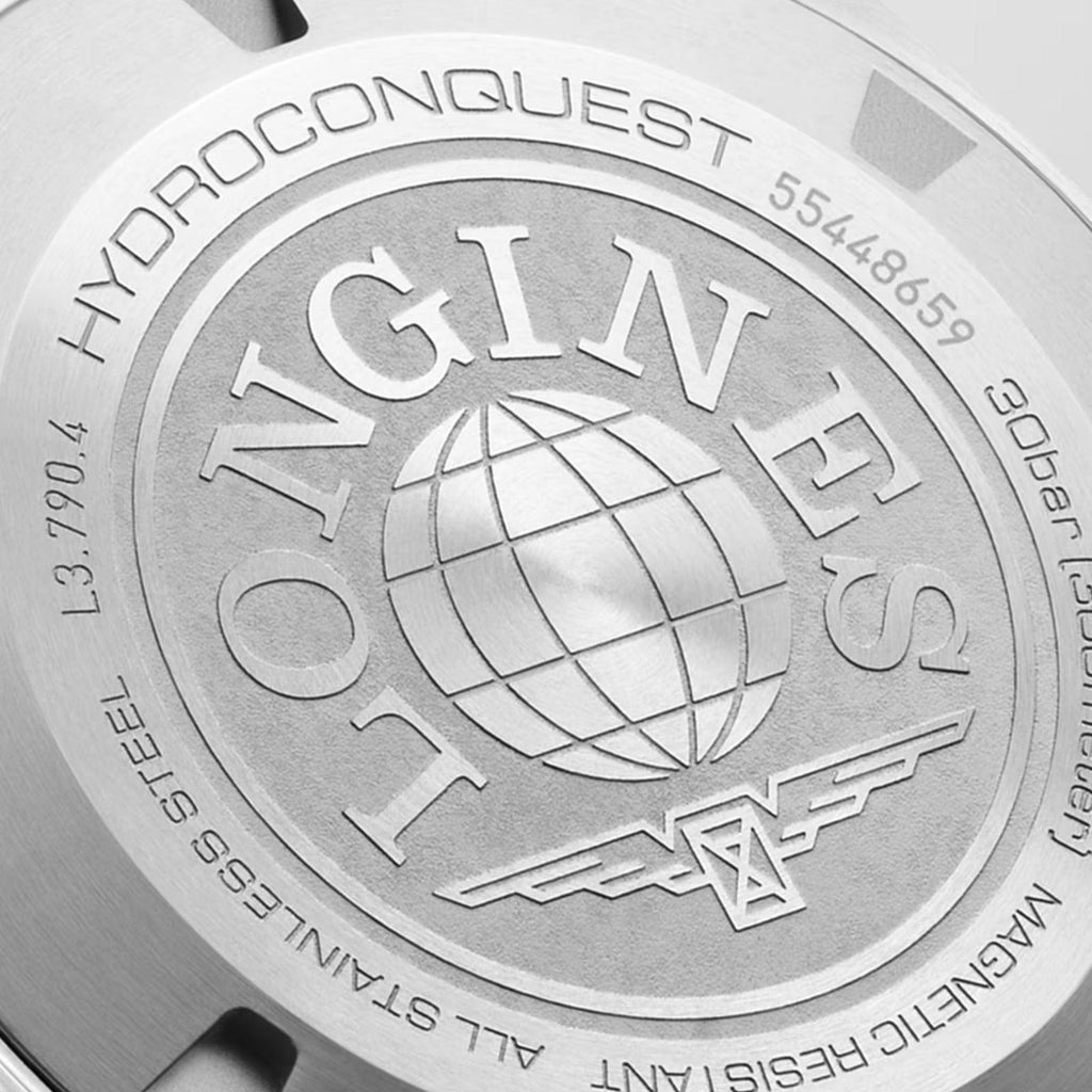 Fondello dell’orologio Hydroconquest GMT in acciaio con logo e globo inciso