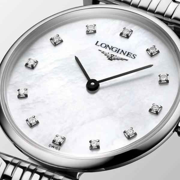 Orologio Longines con quadrante madreperla, indici in diamanti e lancette nere.