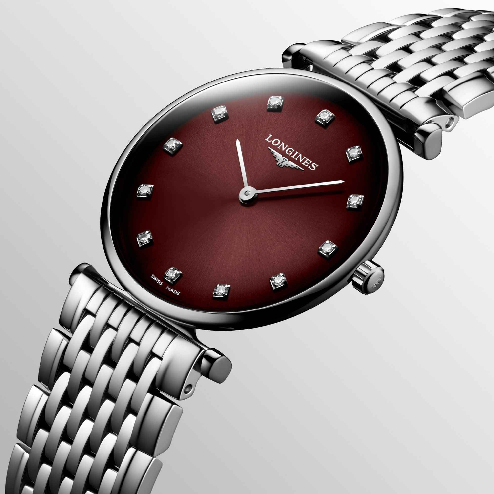 Orologio donna Longines: quadrante bordeaux con indici e bracciale in acciaio a maglie.