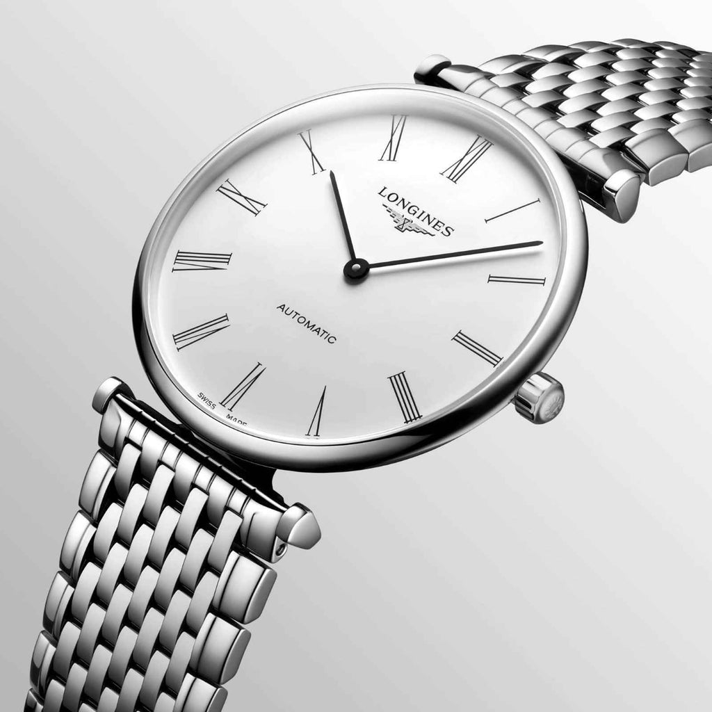 Orologio Longines automatico con quadrante bianco e bracciale in acciaio maglia.