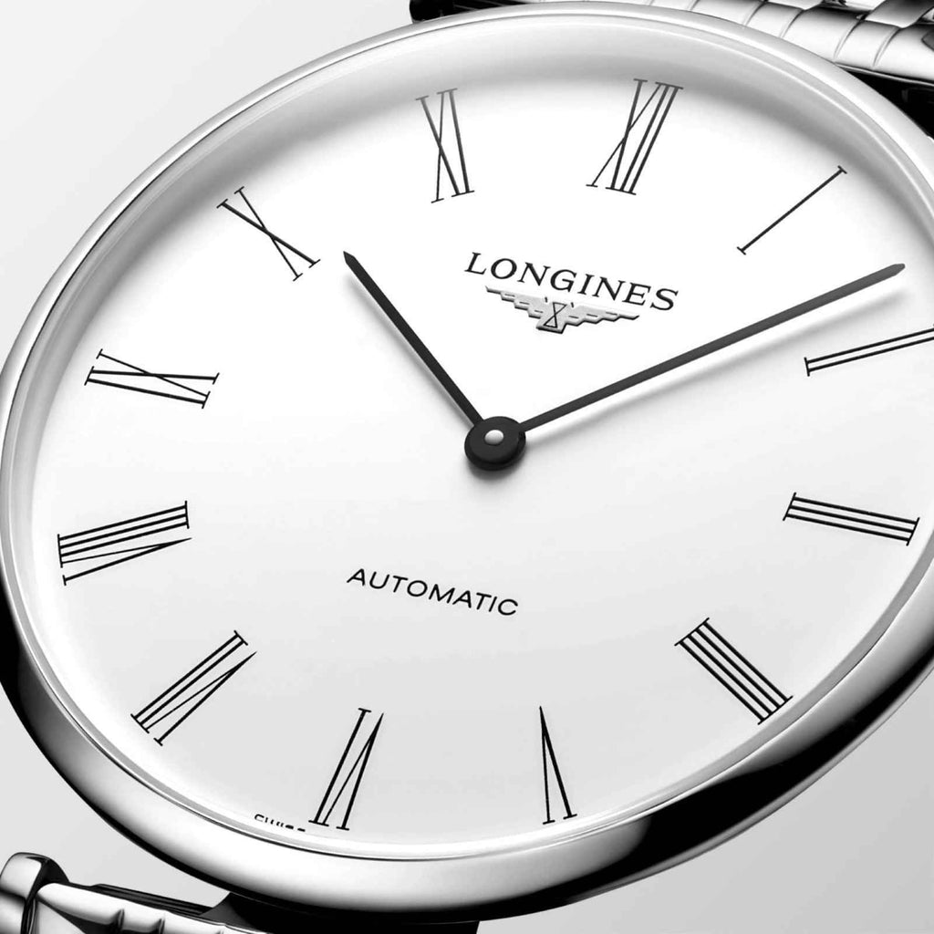 Orologio Longines automatico: quadrante bianco con indici romani e lancette nere.