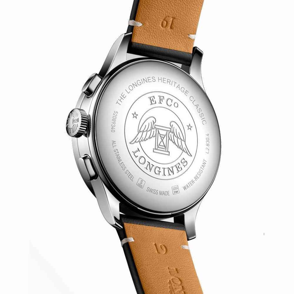 Orologio Longines Heritage Classic sul retro: incisione e cinturino in pelle marrone