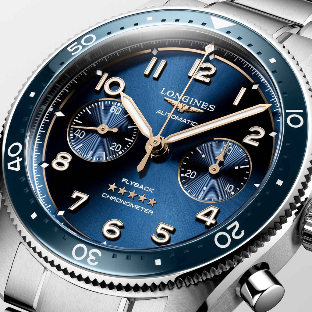 Orologio Longines Spirit con quadrante blu dettagliato e lancette dorate, contatori.