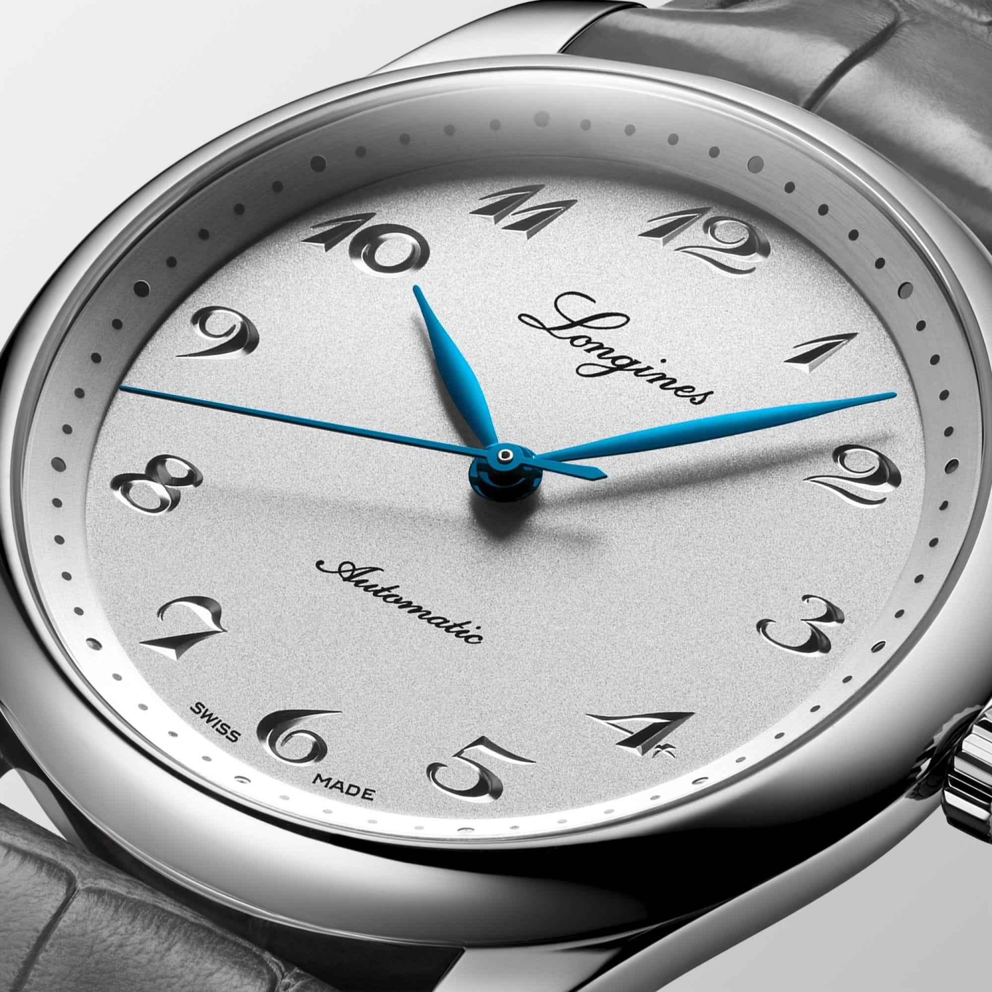 Orologio con quadrante argento, lancette blu e cinturino in pelle alligatore grigio