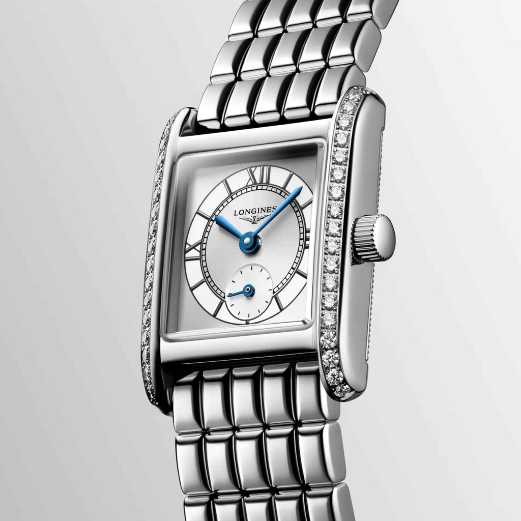 Orologio rettangolare con vetro quadrato, cornice tempestata e bracciale in acciaio lucidato