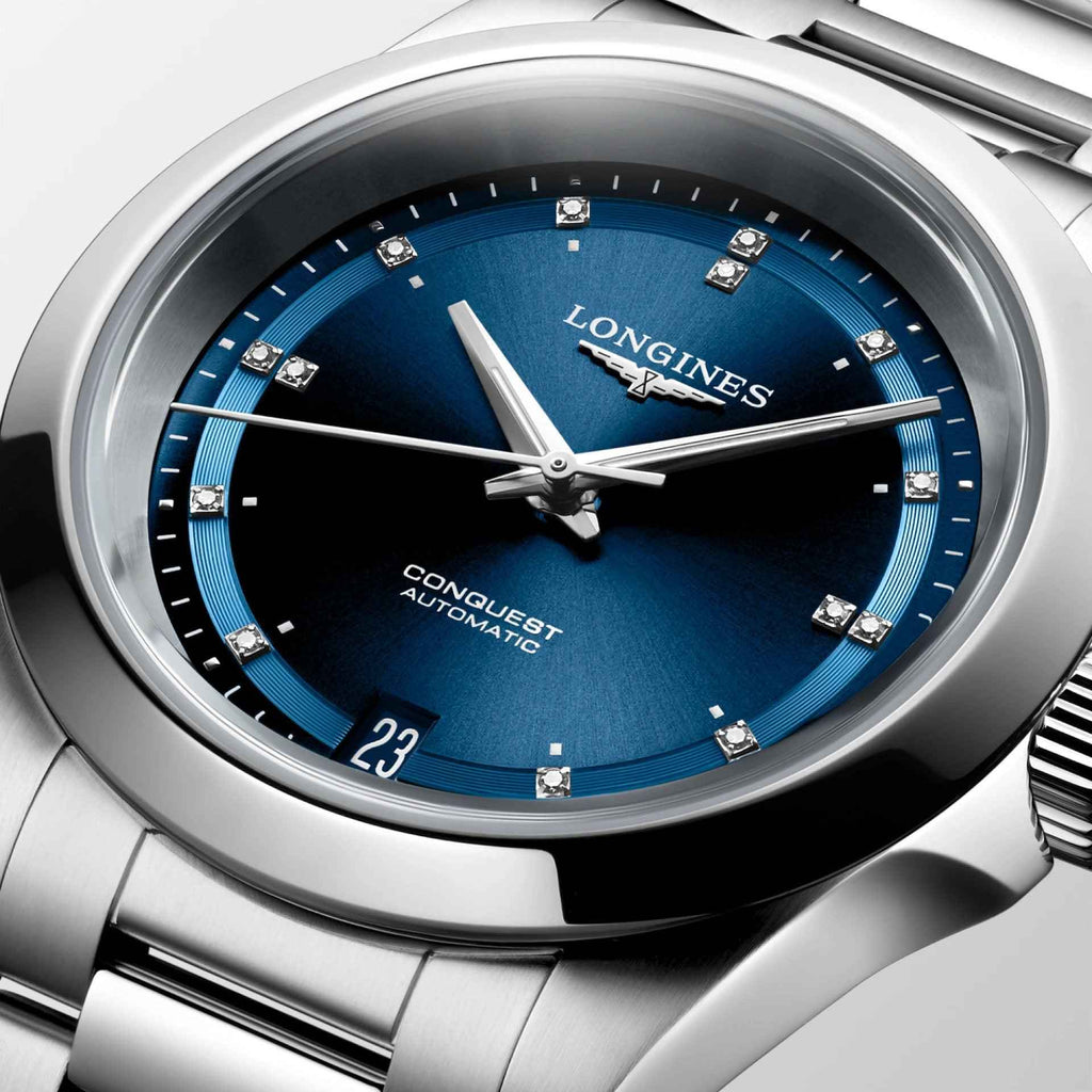 Orologio Longines New Conquest quadrante blu, lancette bianche, indici a rombo, datario 23