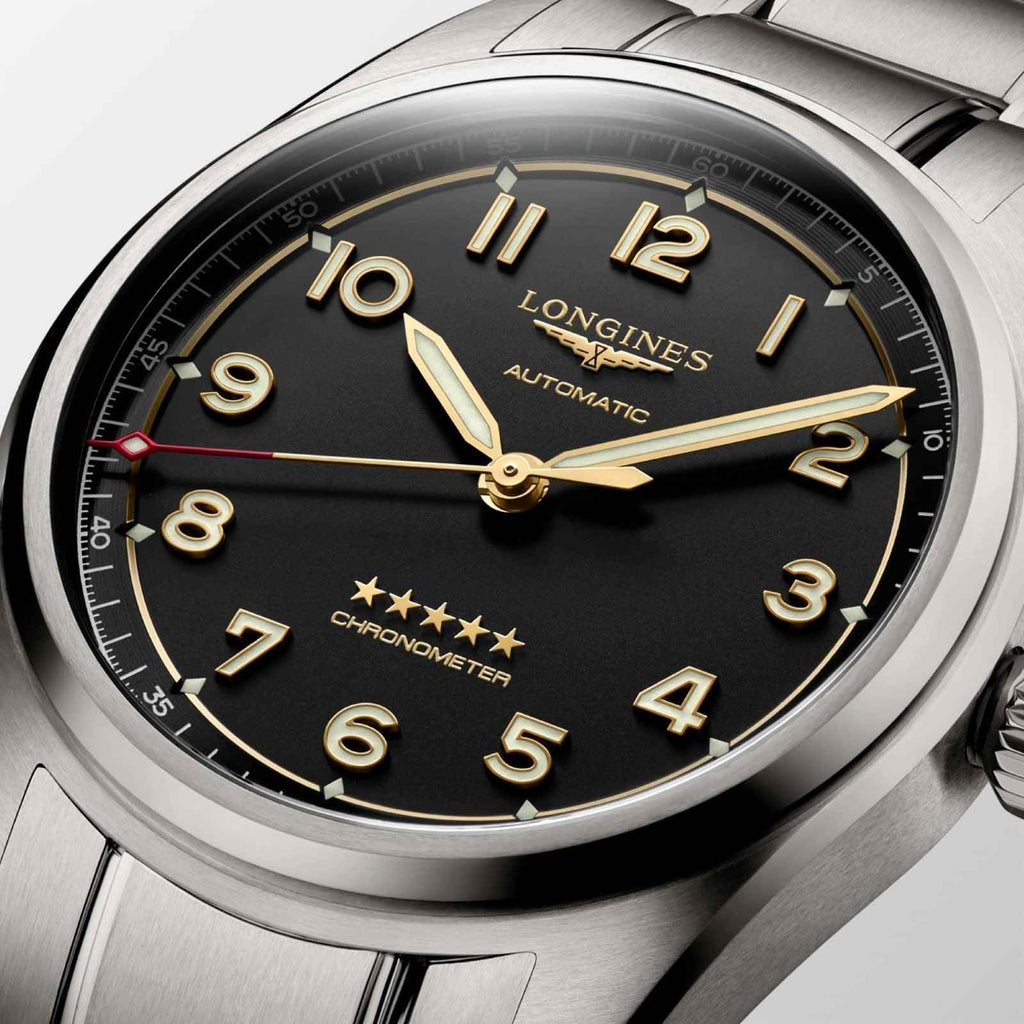 Orologio Spirit 40 mm: quadrante nero con lancette dorate e numeri arabi