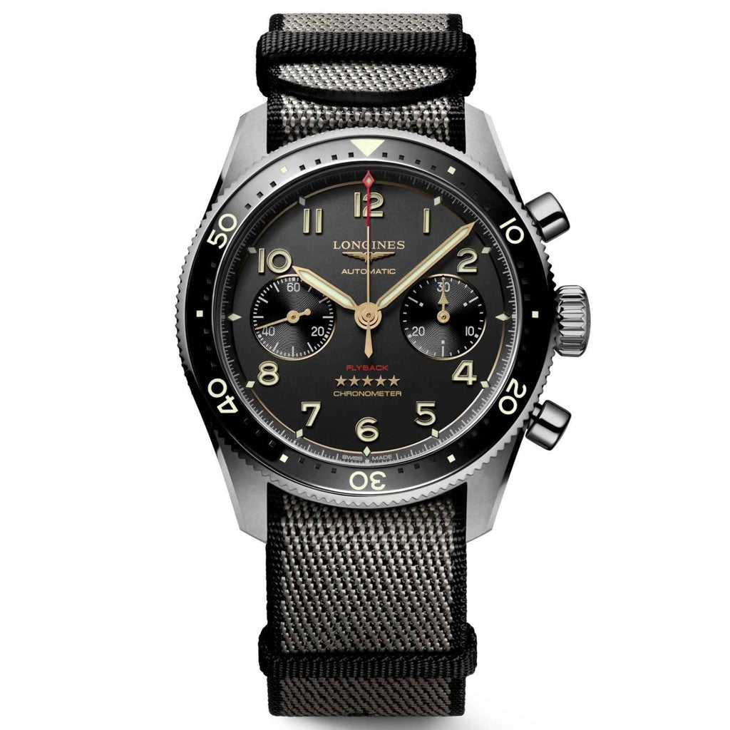 Orologio Longines Spirit Flyback in titanio antracite, quadrante nero e cinturino tessile.