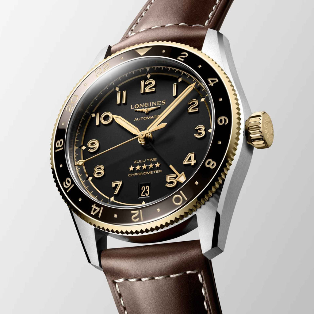 Orologio Longines con quadrante nero e indici dorati, cinturino marrone, corona oro