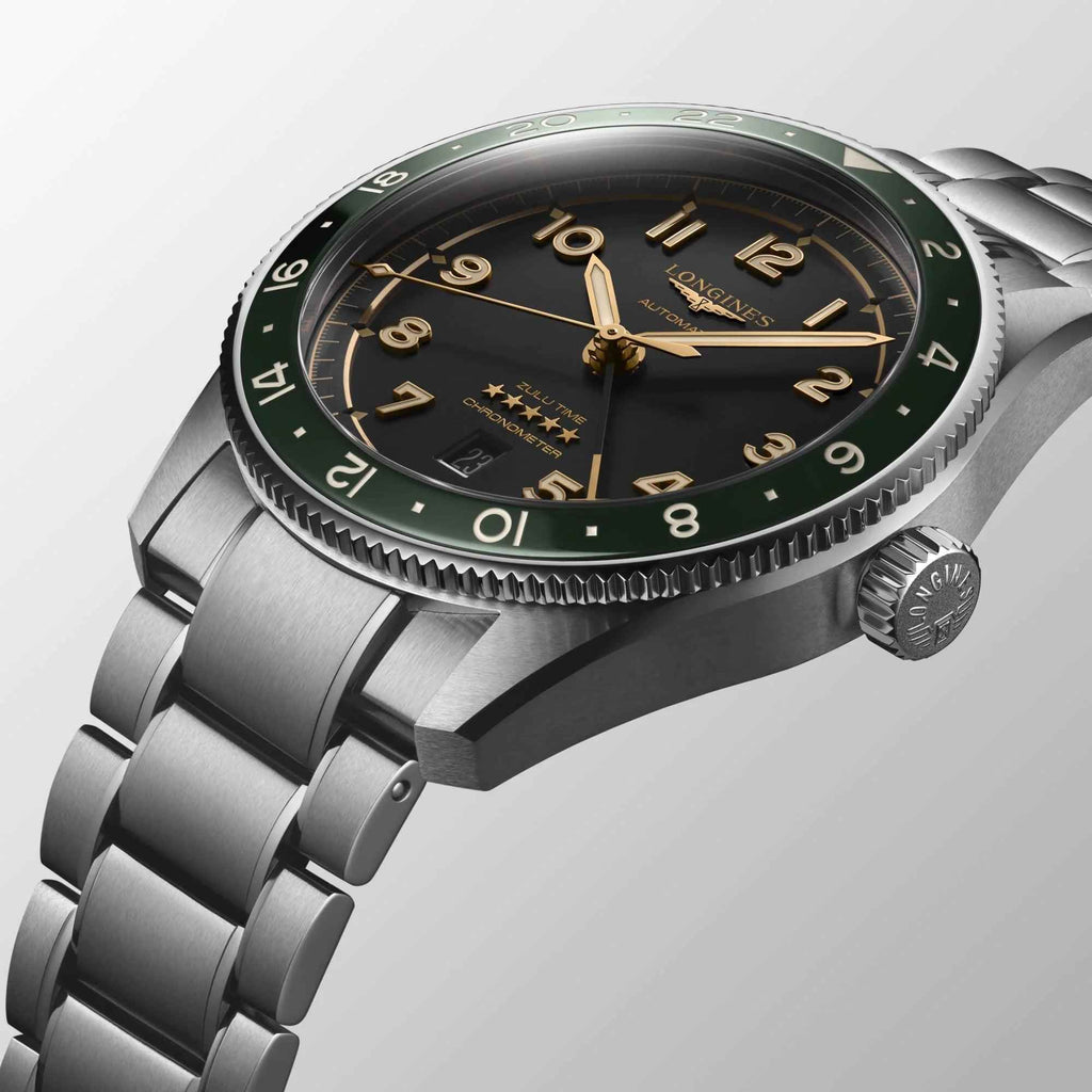 Orologio automatico Longines, quadrante nero con indici dorati e lunetta verde, cassa acciaio.