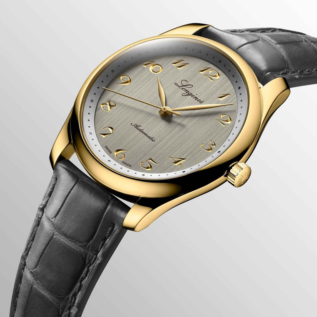 Orologio Longines con quadrante grigio, cassa oro giallo 18K e cinturino alligatore
