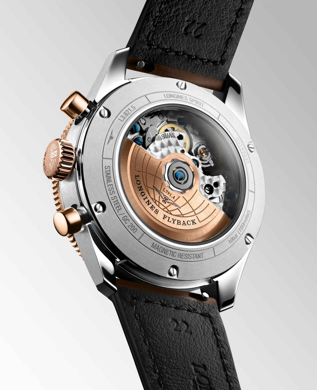 Cassa orologio Longines in acciaio con dettagli oro rosa e corona, cinturino pelle scura