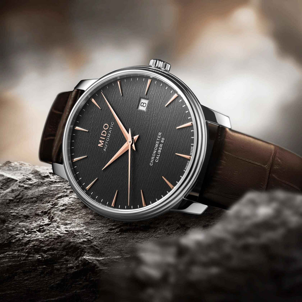 Orologio Mido automatico con cassa in acciaio, quadrante nero e cinturino in pelle marrone