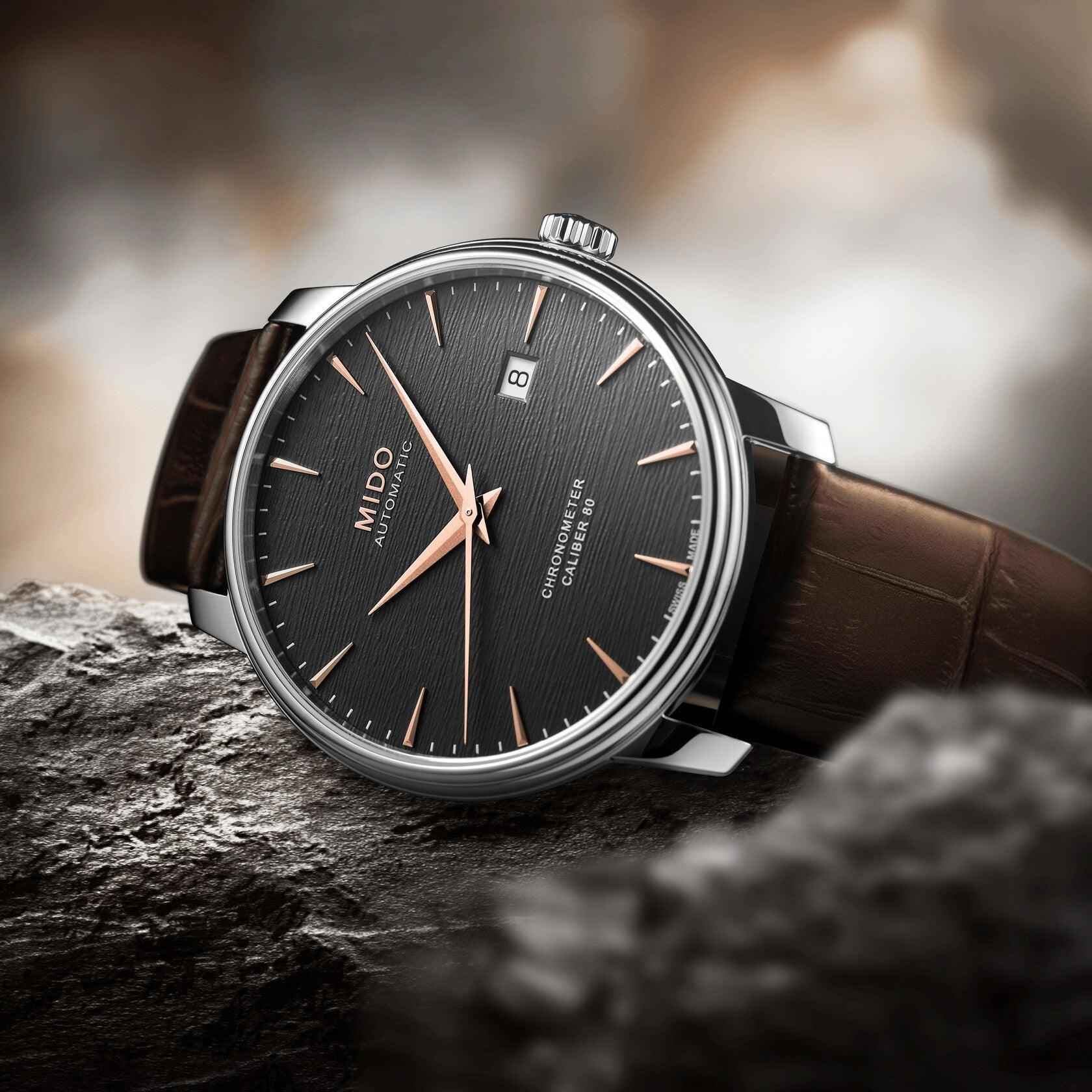 Orologio Mido automatico con cassa in acciaio, quadrante nero e cinturino in pelle marrone