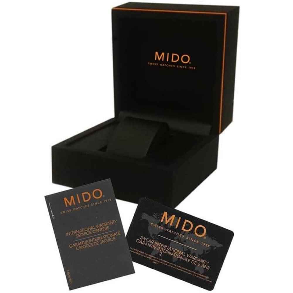 Scatola MIDO nera con coperchio e accessori cartacei con logo MIDO