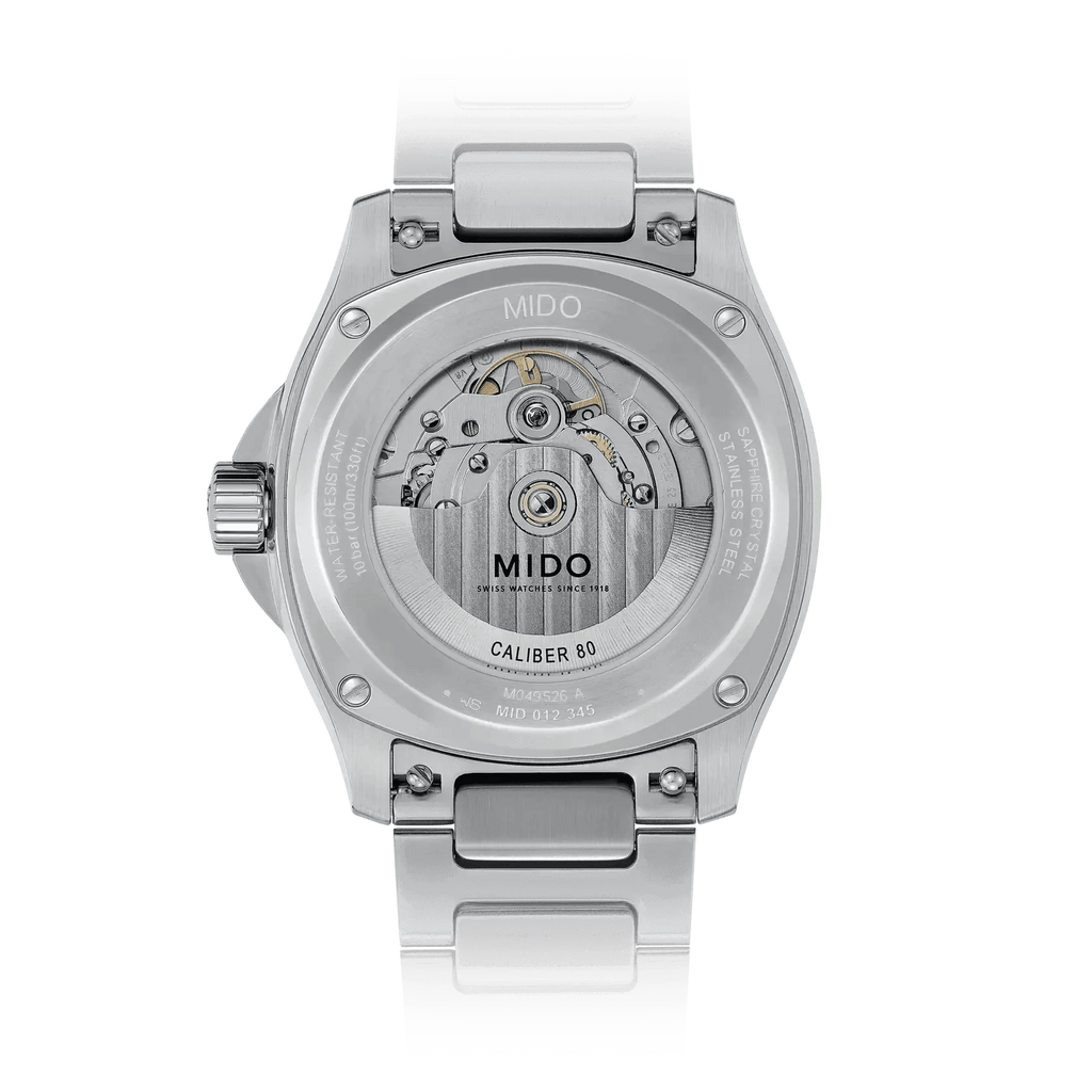 Orologio automatico con quadrante verde e fondocassa trasparente, cassa in acciaio