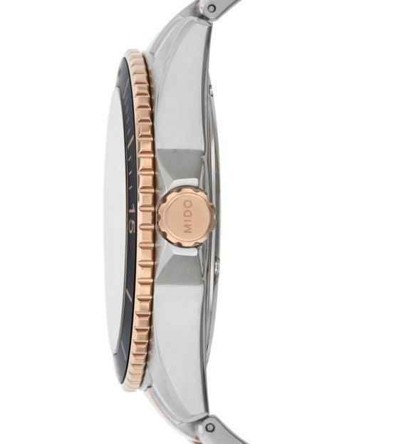 Orologio subacqueo Mido, profilo laterale con corona, bracciale acciaio bicolore
