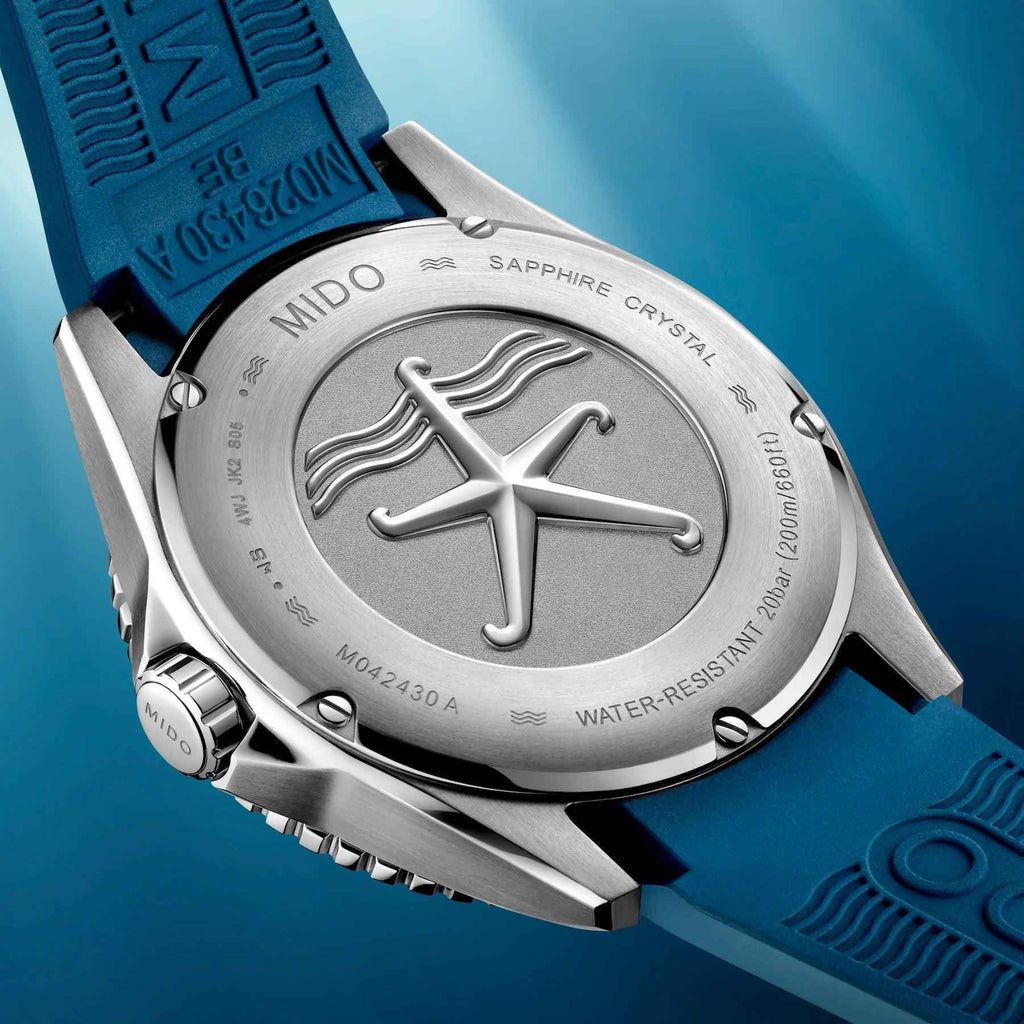 Fondello orologio subacqueo con logo ancora, scritte e cinturino gomma blu