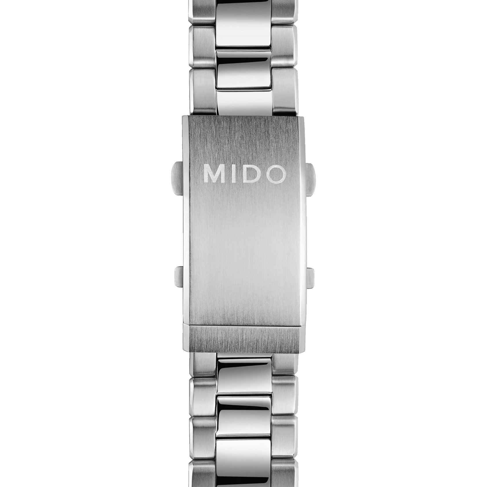 Orologio acciaio con lato e chiusura, cinturino a maglie con scritta MIDO