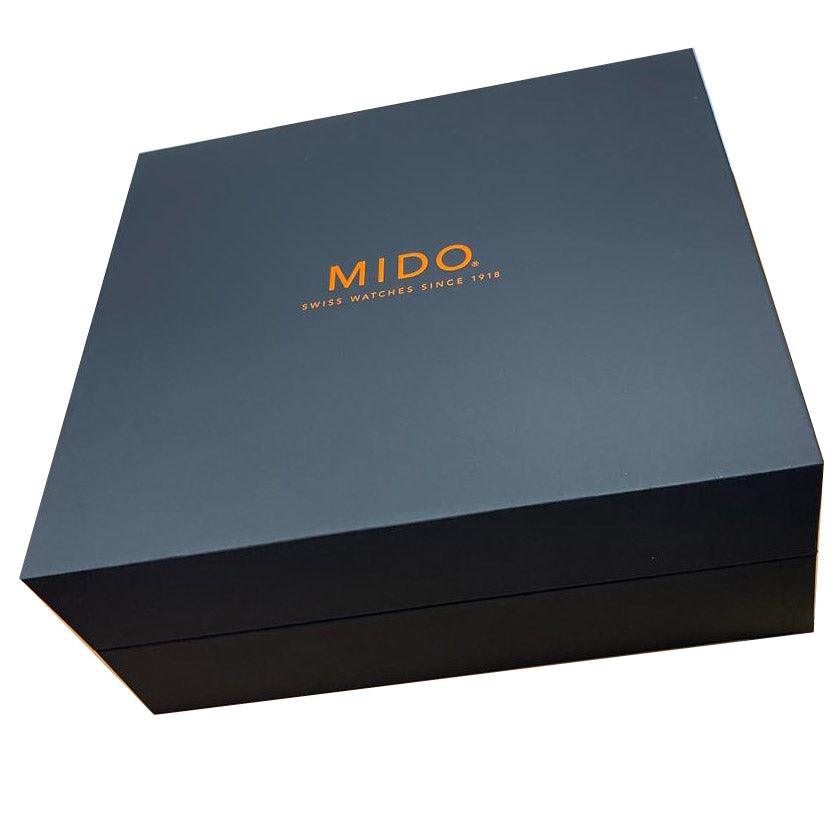 Scatola Mido blu scuro con logo arancione e scritta Swiss Watches Since 1919