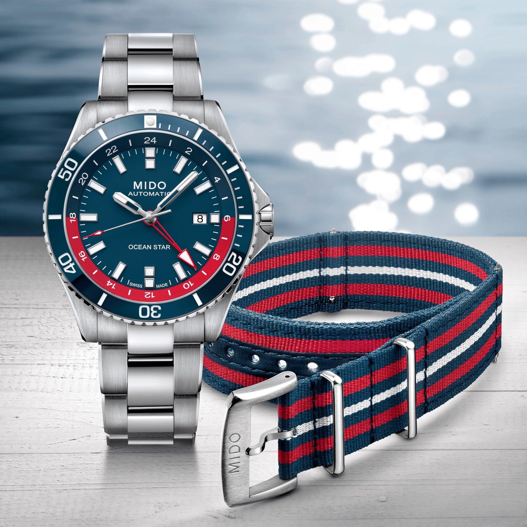 Orologio MIDO Ocean Star GMT con quadrante blu e cinturino NATO a righe