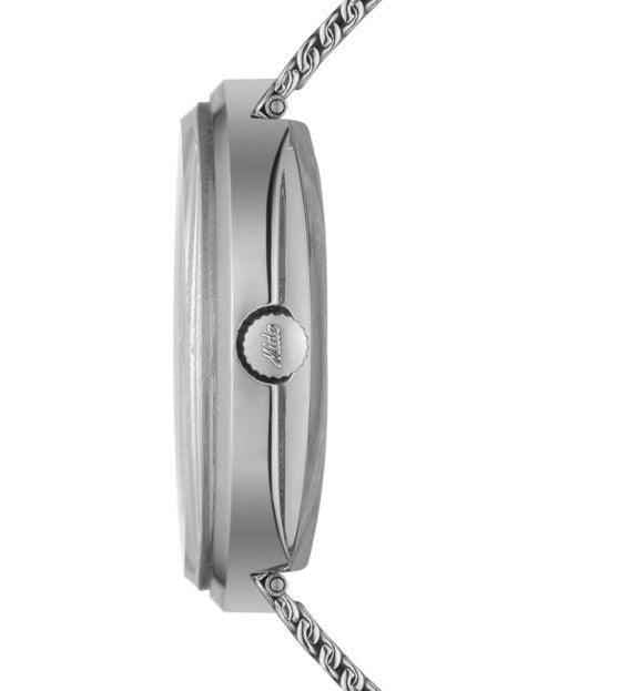 Lato orologio automatico con corona e cassa sottile, cinturino maglia d’acciaio