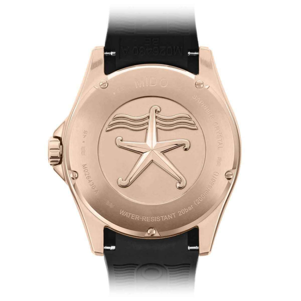 Orologio subacqueo con fondello oro rosa e stella, cinturino caucciù nero