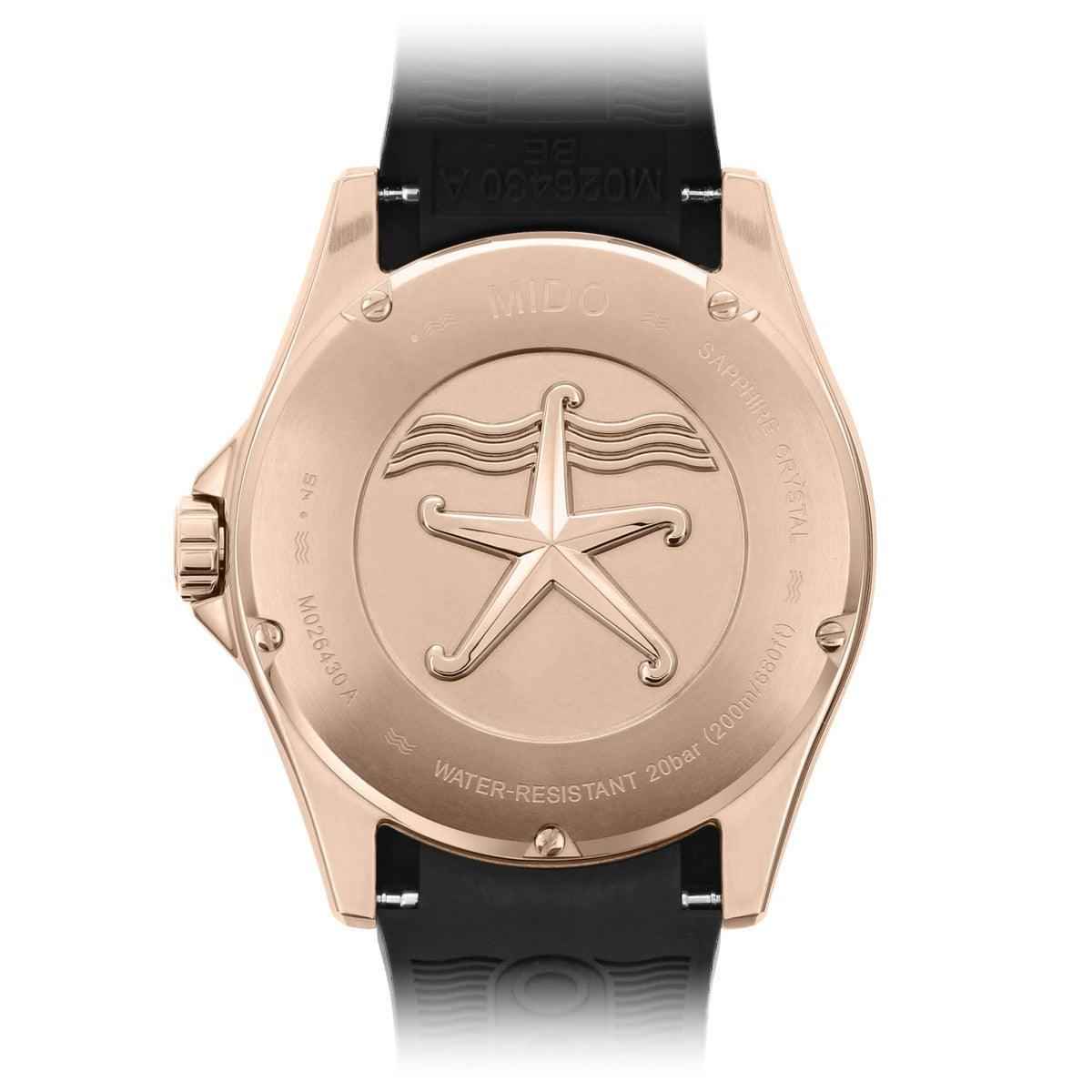 Orologio subacqueo con fondello oro rosa e stella, cinturino caucciù nero