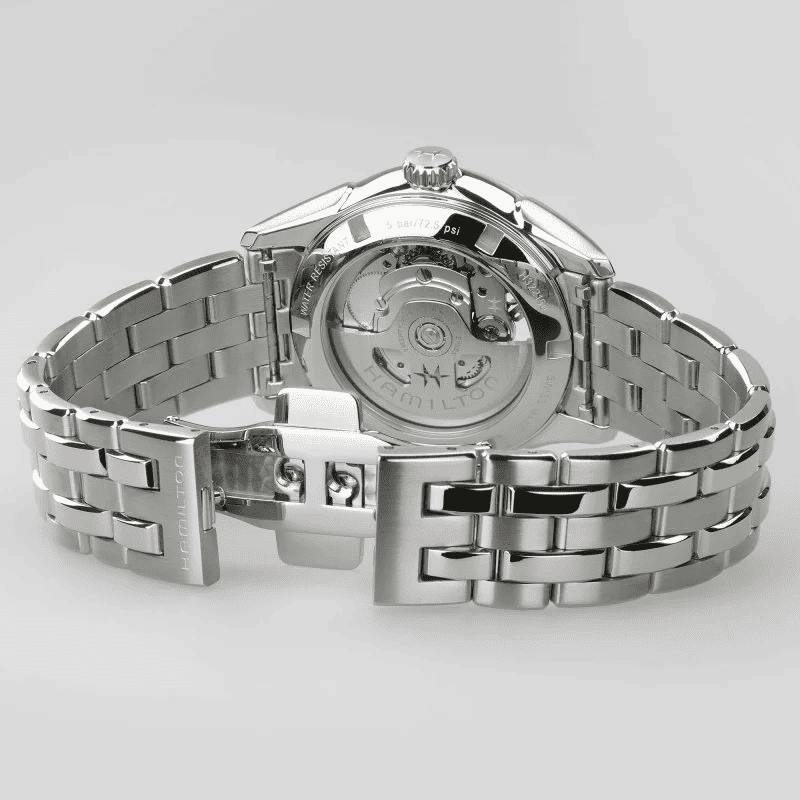Orologio automatico con cassa e bracciale in acciaio, fondello e meccanismo in vista