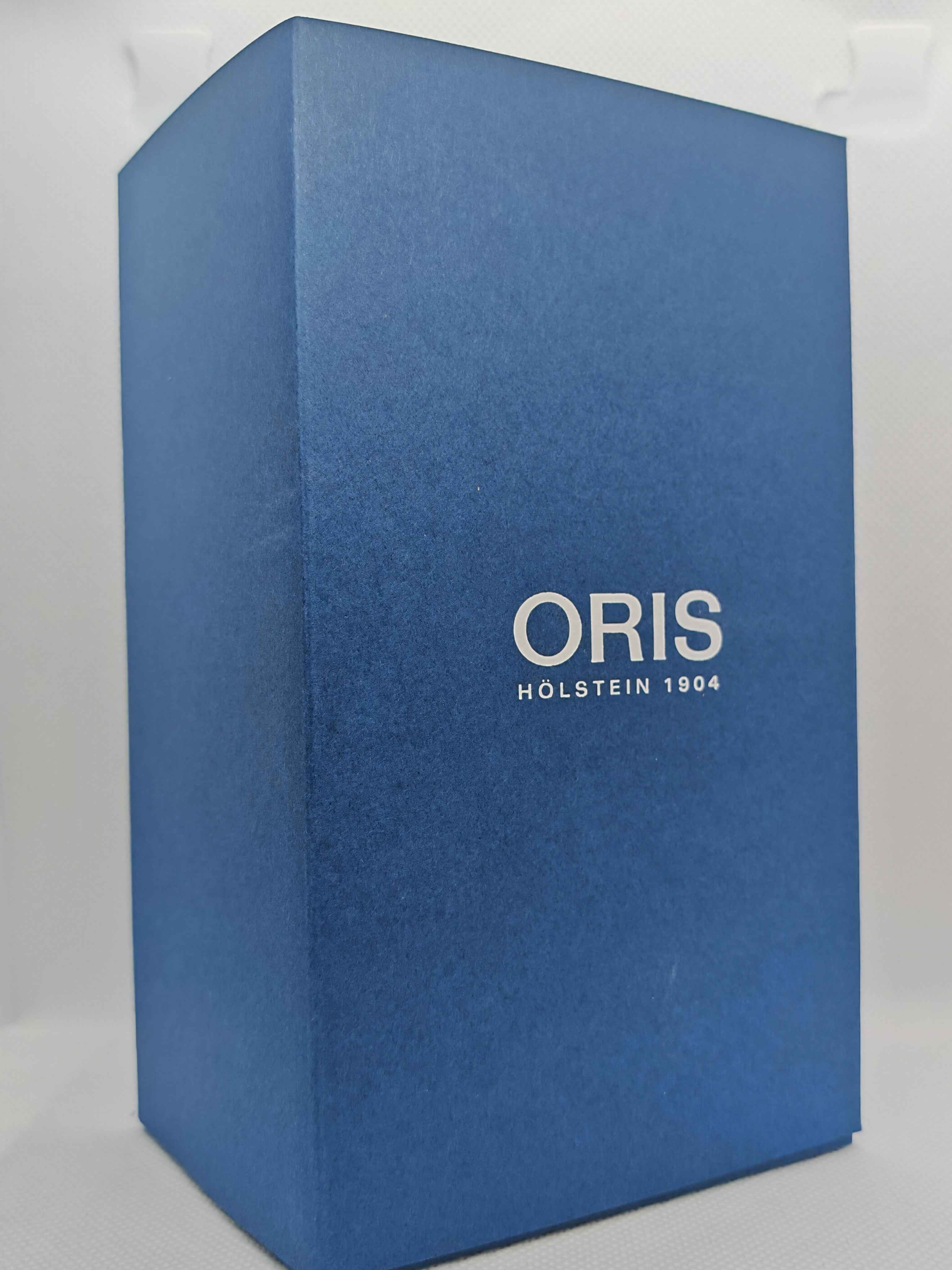 Scatola blu ORIS con coperchio rigido e scritta Hölstein 1904