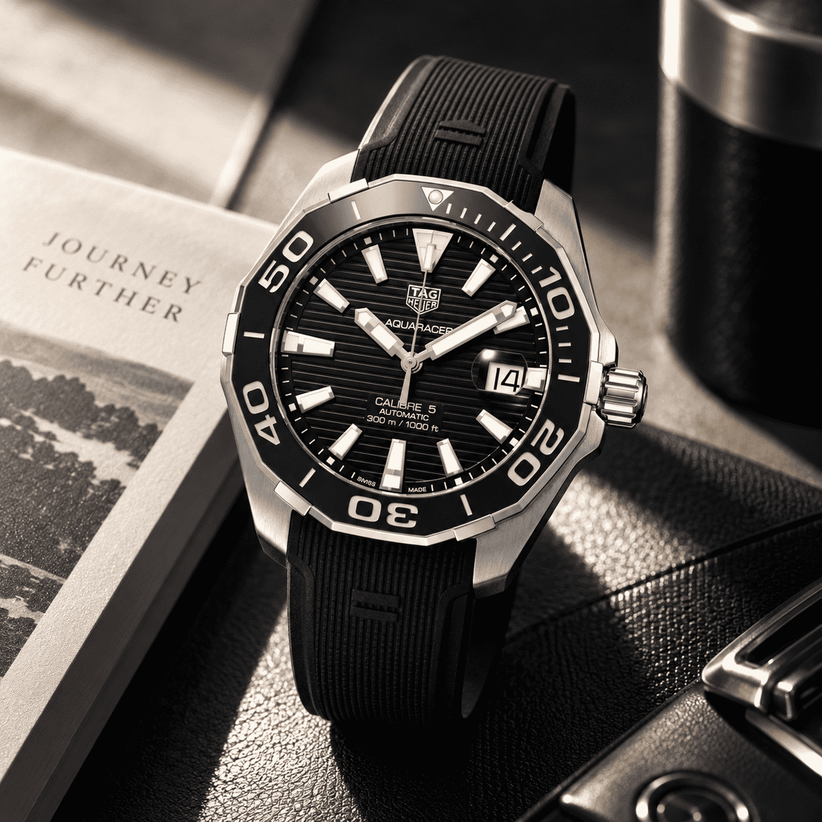 TAG Heuer Aquaracer 300M Calibre 5 Automatico Uomo 43 mm Acciaio Quadrante Nero Soleil Lunetta Girevole Ceramica Nera Vetro Zaffiro Data Cinturino Gomma Nero 38 Ore 30 ATM Swiss Made Ref. WAY201A.FT6142