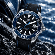 Orologio subacqueo TAG Heuer con quadrante nero, lunetta blu e cinturino nylon blu/nero